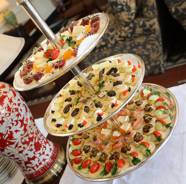 Canapés Served On A Shiny Silver Platter.