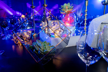 Center table Decore for and event with blue lighting.