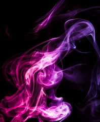 Colored smoke on black background