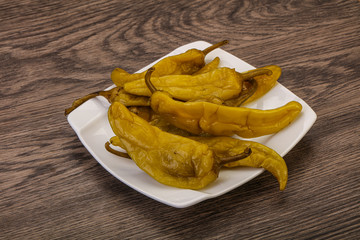 Marinated spicy and hot green pepper
