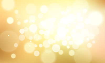 Gold glittering background with bokeh effect. Golden twinkled light backdrop for Wedding or Christmas xmas card