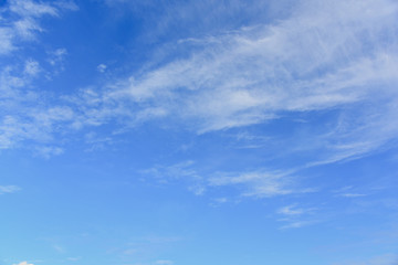 Naklejka na ściany i meble Blue sky with white clouds for texture background