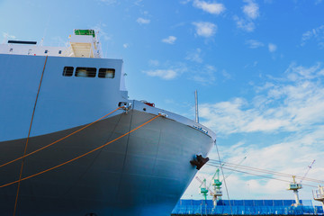 Large cargo ships with mooring rope Ship on the port wharf
