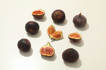Flat lay with fig fruits on white background