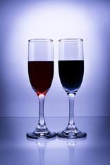 Two flute  glasses with liquor and vignette - tall shot