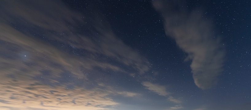 Beautiful long exposure  evening sky with clouds and starry sky.  Nature background.