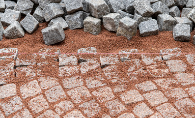 Straßenbau mit Granitpflastersteinen