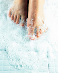 Fototapeta premium feet in soap water