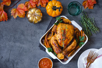 Thanksgiving celebration traditional dinner setting meal concept. Thanksgiving dinner with chicken. Flat lay. Banner. Top view