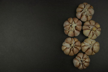  garlic on the black background