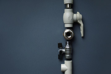Plumbing background with fittings. Copy space.
