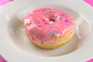 donut with pink icing