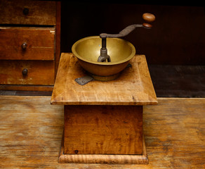Antique manual wooden coffee grinder