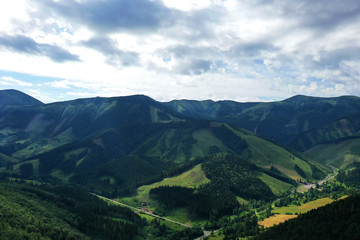 Naklejka na ściany i meble Aerial view of the Mala Fatra mountains in the village of Terchova in Slovakia