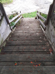 Obraz premium Perspective view of wooden stairs with steep incline. Detail of Caribbean and tropical architecture.