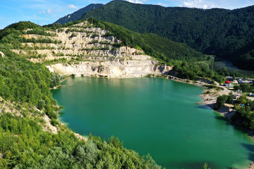 Obraz na płótnie Canvas Aerial view of a lake in the village of Sutovo in Slovakia