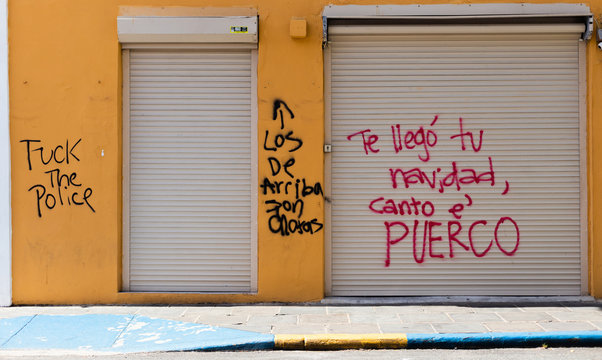 Pictures of the riots and vandalized buildings of puerto rico during the riots of summer 2019 in old san juan business closed and looted 