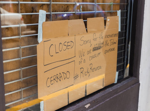 Pictures of the riots and vandalized buildings of puerto rico during the riots of summer 2019 in old san juan business closed and looted 
