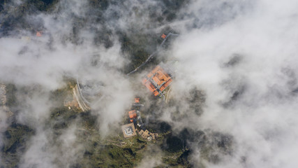 Aerial view architecture of the temple and pagoda on the top of the Fansipan mountain with a beautiful natural scenic of Sapa, Lao Cai, Vietnam