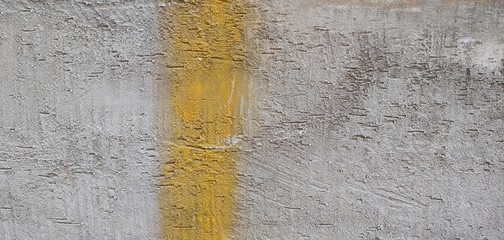 coarse gray walls with yellow vertical line_background