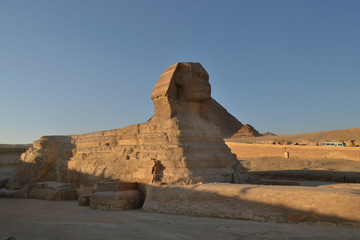 Greatest wonder of the world, the Egypt pyramids and the stone Sphinx on the Giza platou in endless...