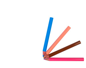 One pattern made with four different colored wood pencil crayons on white paper