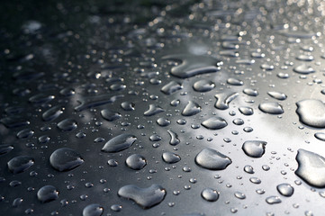Drops of water on metallic car’s body