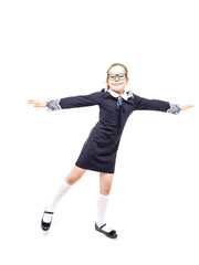 Girl in a blue school uniform emotionally posing on a white background 