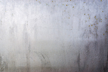metal surface with paint worn paint. Background wall.