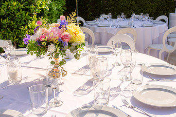 set table with empty dishes and clean glasses