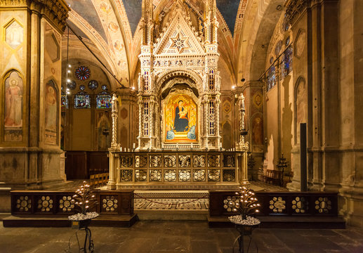 FLORENCE, ITALY - NOVEMBER 5, 2016: decoration of Orsanmichele church in Florence city. There is Andrea Orcagna's Gothic Tabernacle (1355-59) with older icon of the Madonna and Child by Bernardo Daddi