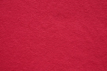 Red fabric cloth texture background close up