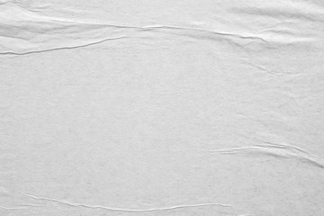 Obraz premium Blank white crumpled and creased paper poster texture background