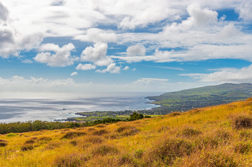 Obraz premium Aerial cityscape of Hanga Roa city and the Pacific Ocean from Rano Kau volcano, Easter Island (Rapa Nui), Chile.