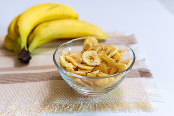 Healthy snacks dry bananas in a bowl. Dried fruits