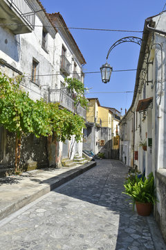 A narrow street among the old houses of Aieta, a rural village in the Calabria region.