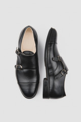 Male classic shoes. Elegant black monk shoes