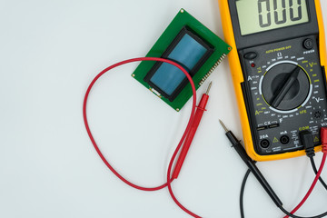 multimeter on a white