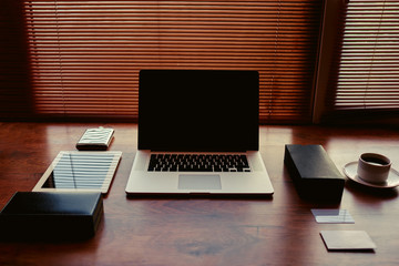 Freelancer needs workstation with accessories and cup of coffee, open laptop computer and digital...