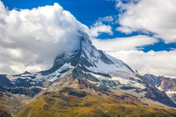 The Matterhorn.  It is a mountain of the Alps, straddling Switzerland and Italy, its summit is...