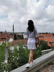 The girl from the Castle of Eger looks at the city