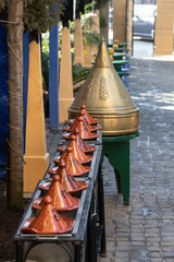 Tagines lined up as display outside restaurant Casablanca Morocco