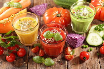 assortment of colored vegetable soup and fresh ingredient
