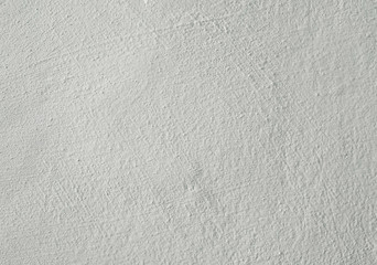 White plastered rough wall texture with large brush strokes