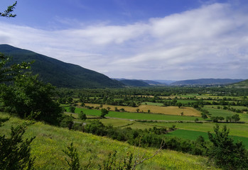 Landscape of the Aragón River Valley and view of the village of Lárrede in the rear. Huesca. Spain.   