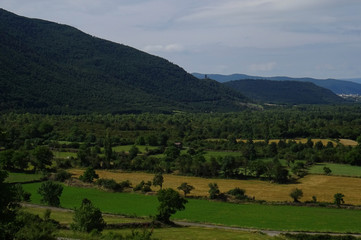Landscape of the Arag&oacute;n River Valley and view of the village of L&aacute;rrede in the rear. Huesca. Spain.   