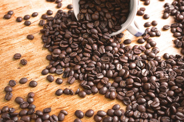 Coffee beans on wooden background. Copy space. 