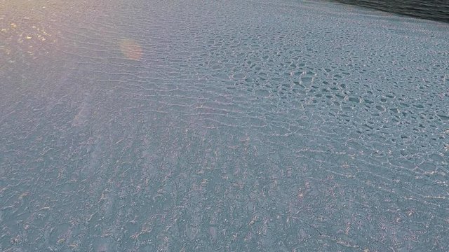 A sun set on Lake Superior in Winter 