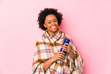 Middle age african american woman in a camping isolatedhappy, smiling and cheerful.
