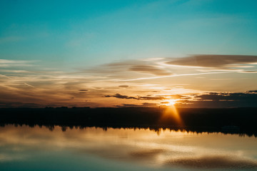 Obraz premium sunset over the river
